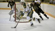 Bisons forward Liam Bilton chases Joel Topping behind the net