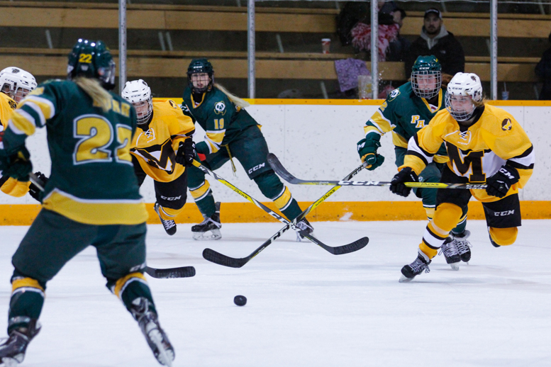 Sports_Women Hockey vs Panadas on road_photo by Star Roxas_web Bisons and Pandas in action at the Wayne Fleming Arena