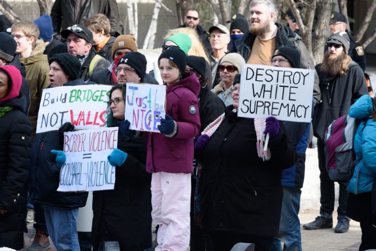 Photo of counter-protesters challenging anti-Motion 103 protesters in Winnipeg.