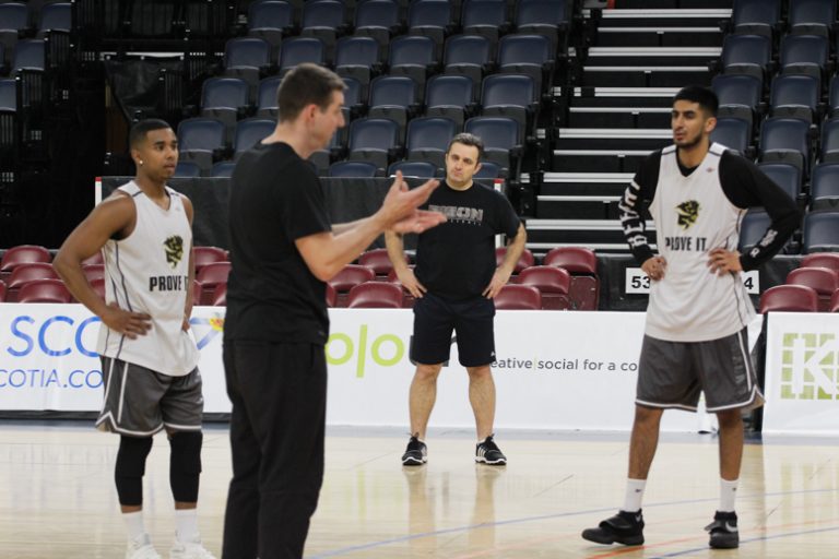 Kirby Schepp discussing with his players at U Sports nationals in Halifax