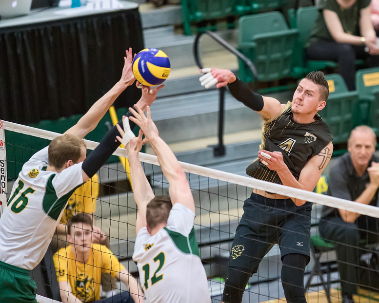 Sports Volleyball Nationals March 17th 2017_ Alberta VS Manitoba_photo Courtesy of Don Voaklander_web Manitoba's Devren Dear goes for a kill against Alberta