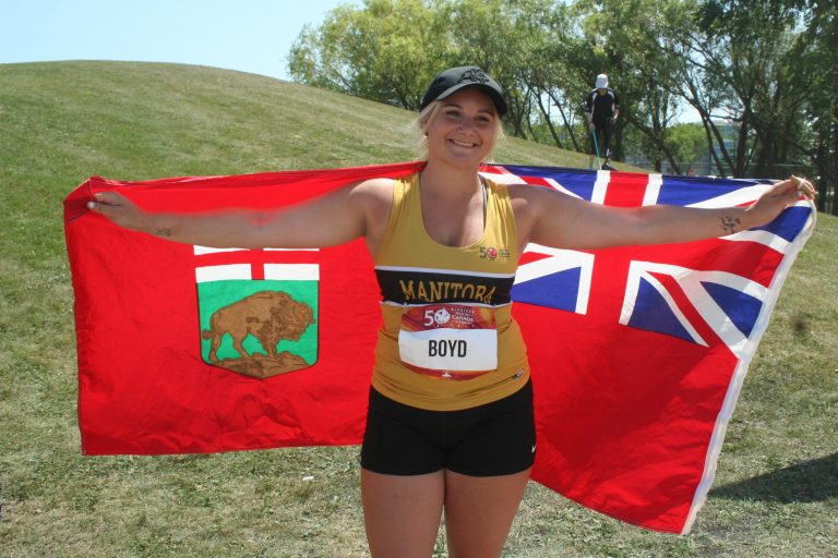 Bison athlete Brooke Lynn Boyd celebrates winning the bronze medal in javelin at the 2017 Canada Summer Games in Winnipeg.