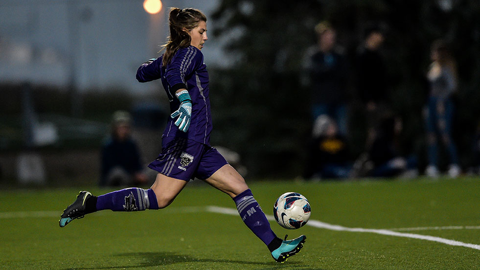 ustina Jarmoszko boots the ball against the Regina Cougars on Sept. 8.