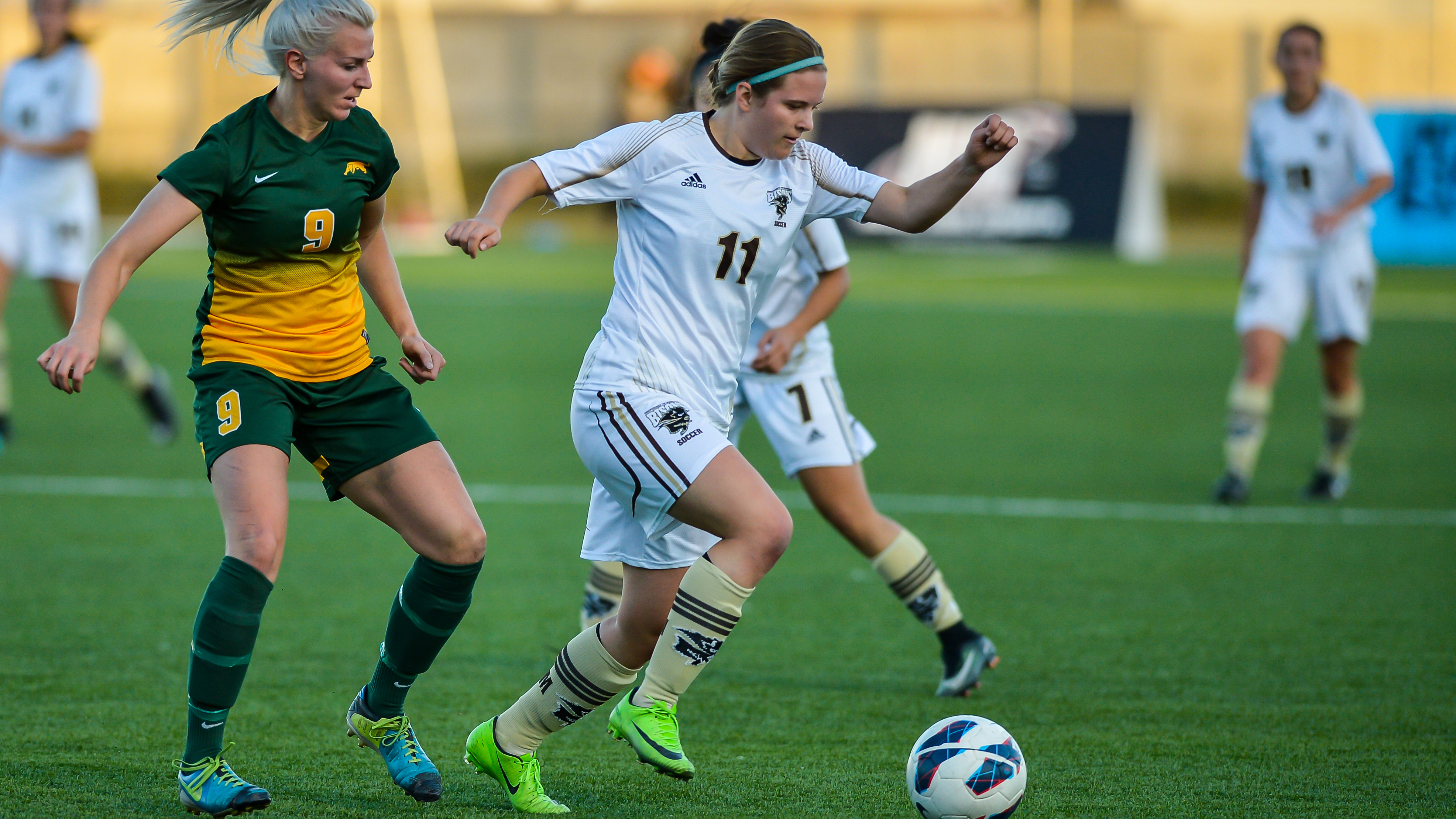 Bison midfielder Sara Schur fends off a Regina player during the home opener on Sept. 9.