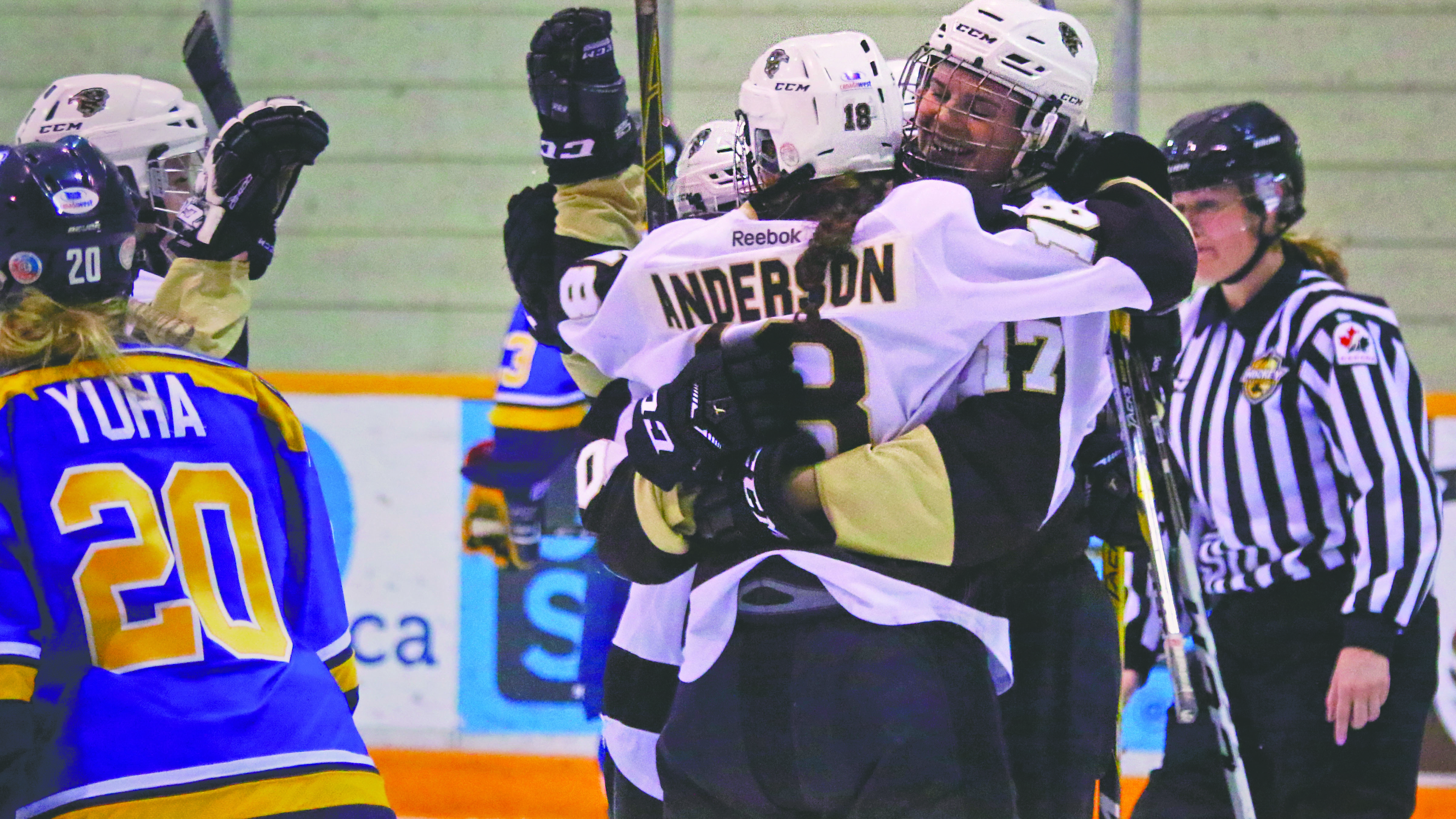 Sports_Women's_Hockey__Photo by Megan Colwell_RGB web Bisons celebrate a goal against Lethbridge last season.