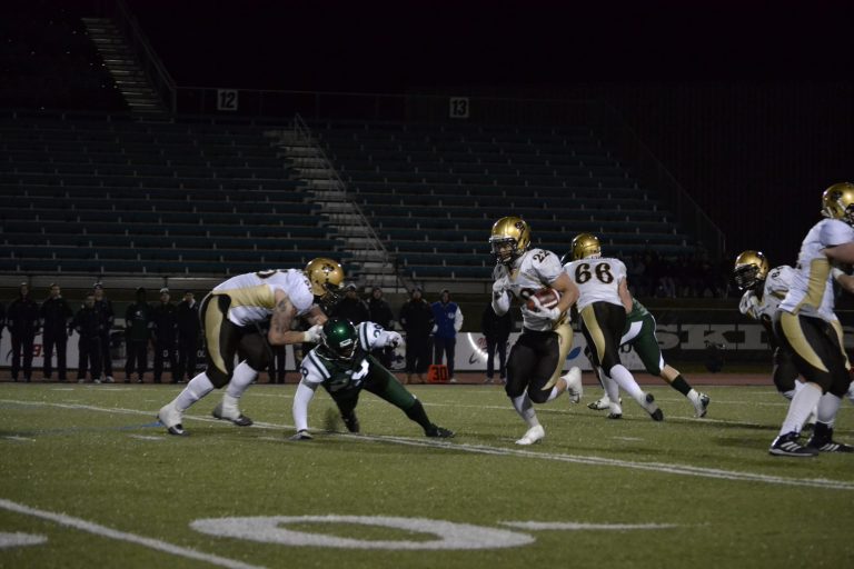 Bison running back Jamel Lyles makes a run against the Huskies. Lyles finished with 169 yards and a touchdown in the win.