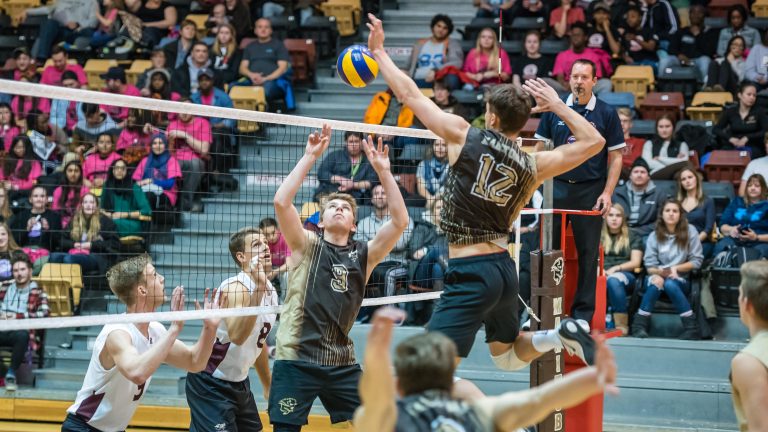 Men’s volleyball earns a surprising split against UBC, women get swept
