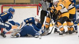 Bison forward Lauryn Keen rushes for loose puck possession as UBC’s goalie Tory Micklash, Emily Costales and Jenna Fletcher attempt to defend on Saturday, Dec. 2 at the Wayne Fleming Arena. Manitoba won 2-1.