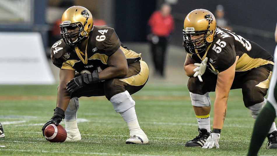 Bison Sports 2017 Bison centre Anthony Daley (left) during a game against the Saskatchewan Huskies.