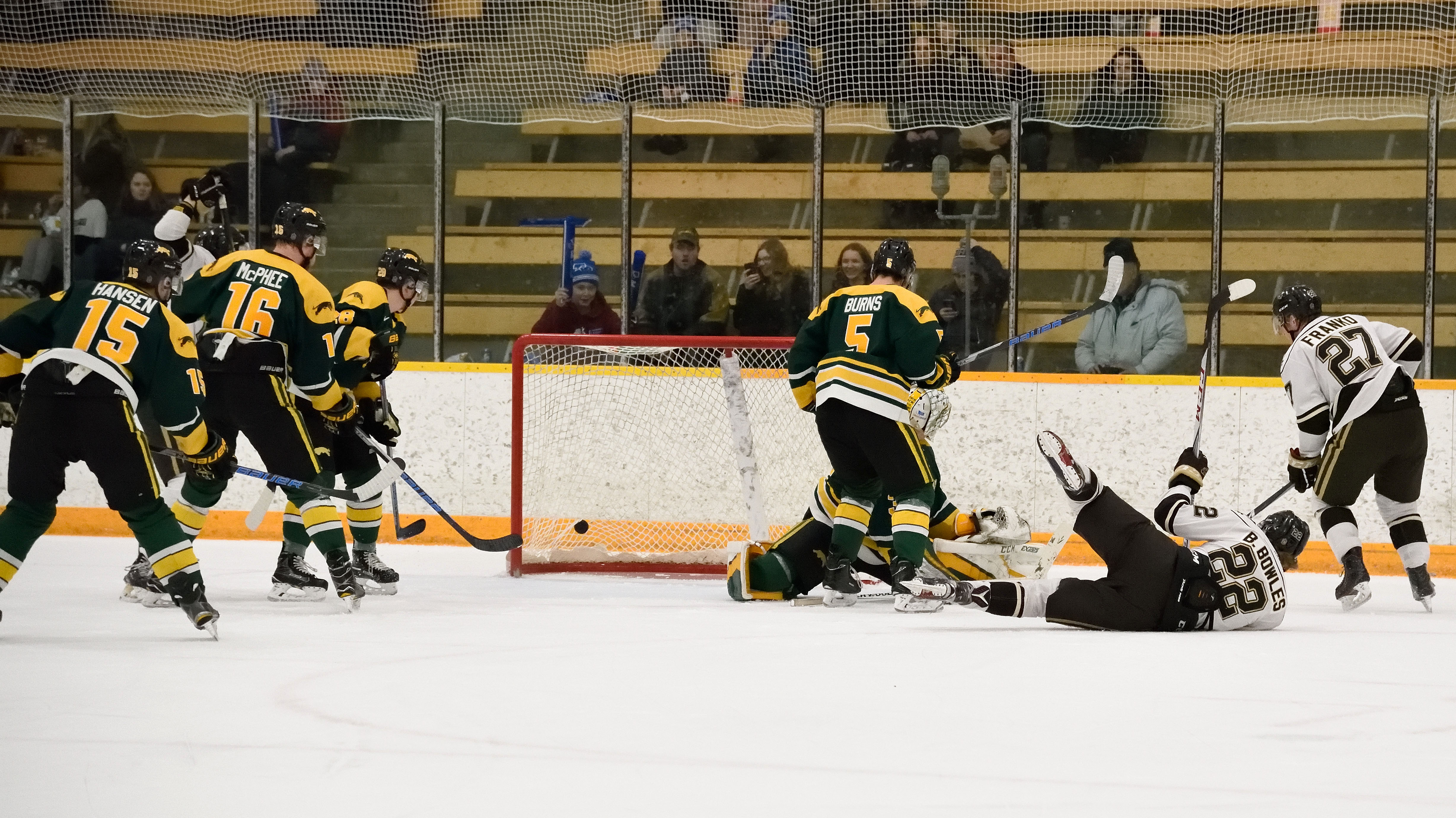 Sports_Mens Hockey recap_Photo by Chantal_Zdan_RGB web Bison forward Brad Bowles scores in spectacular fashion against the Regina Cougars on Jan. 26 at the Wayne Fleming Arena. Manitoba won 8-6.