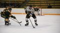 Bison forward #26 Quintin Lisoway keeping possession against a tough Golden Bear defence.