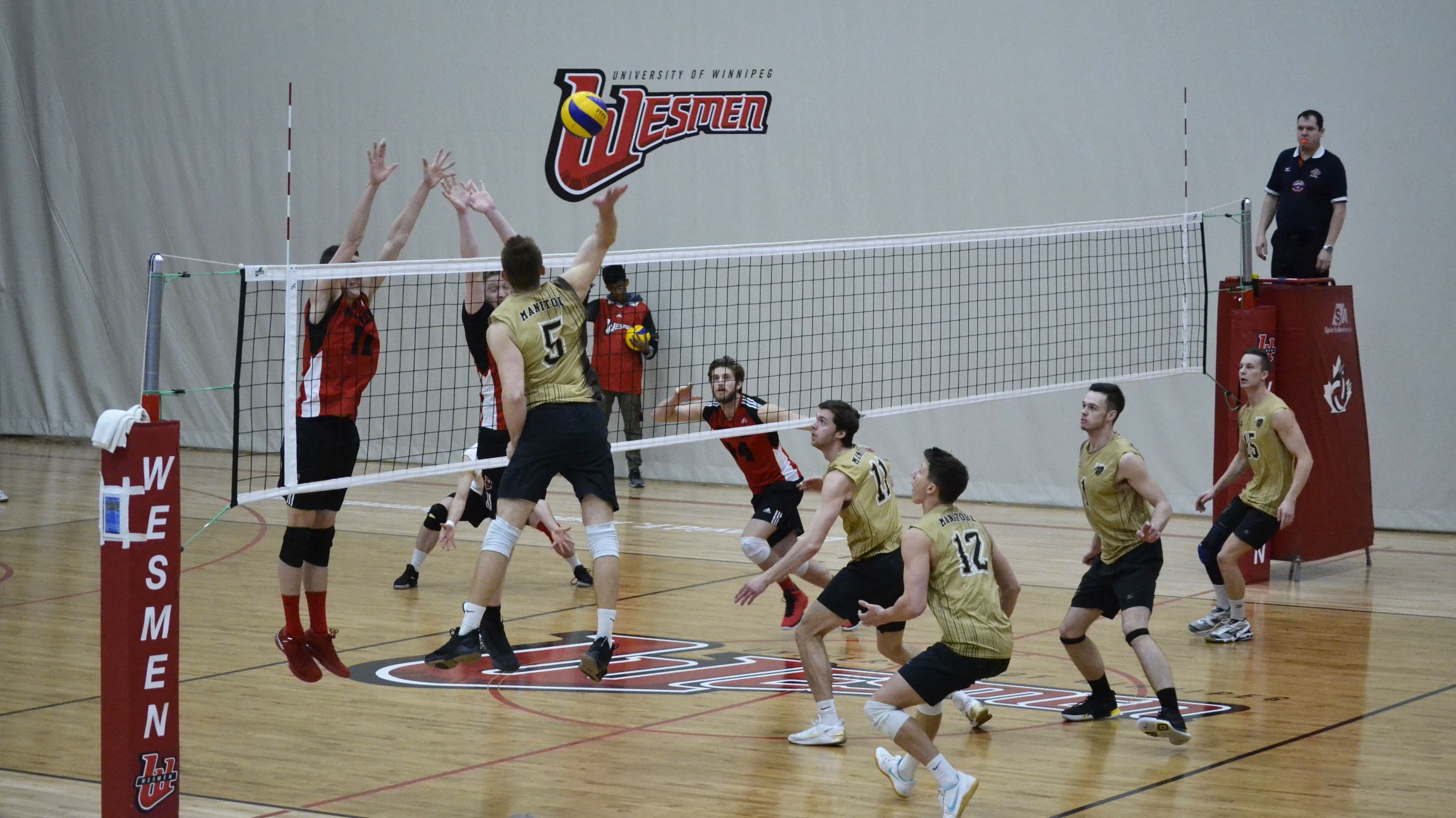 Sports_Wesmen Recap_Photo by Chantal Zdan_RGB web Bison power Scott Vercaigne goes for a spike against a strong Wesmen defence during the 3rd place match at the 51st Classic tournament, on Saturday at the Dr. David F. Gymnasium.