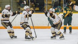 Bisons Jordyn Zacharias and Venla Hovi celebrate Zacharias' series clinching goal against Alberta in game three of the Canada West semifinals on Feb. 25 at the Wayne Fleming Arena in Winnipeg.