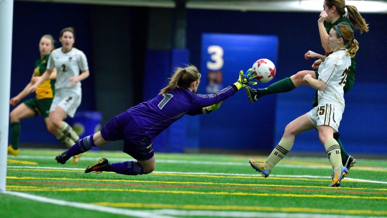 Bison goalkeeper Justina Jarmoszko makes a save against the Regina Cougars during a pre-season tournament on March 25 at the Winnipeg Soccer Federation North in Winnipeg. Manitoba won the match on penalties after a 1-1 draw after 90 minutes.