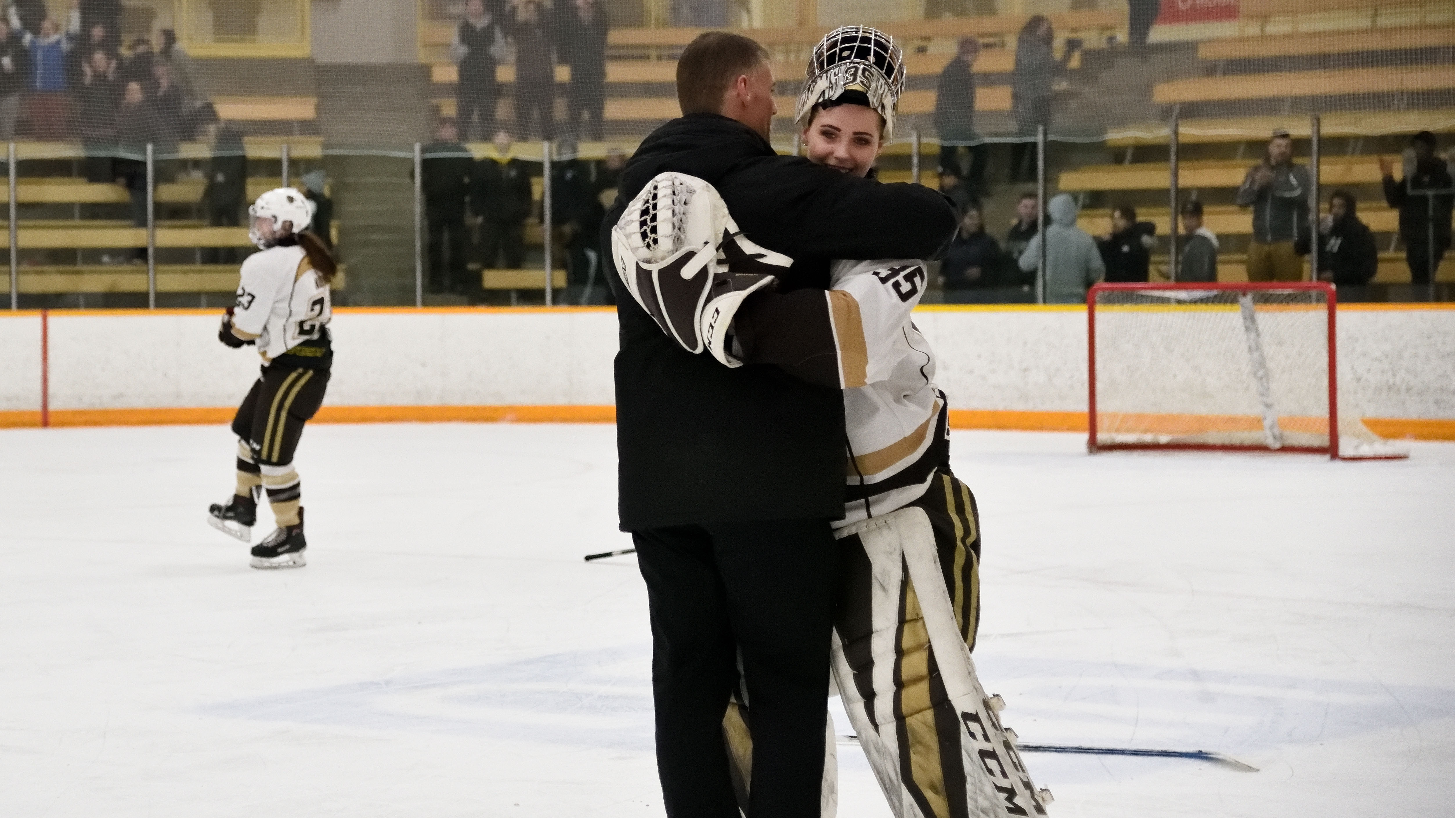 Sports_Bison Notes -Lauren Taraschuk_Photo by Chantal Zdan_RGB web Canada West Rookie of the Year Lauren Taraschuk embraces Canada West Coach of the Year Jon Rempel after being the Saskatchewan Huskies in game two of the Canada West Final on March 3.