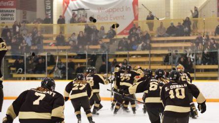 Bisons celebrate winning the Canada West Championship on March 3 at the Wayne Fleming Arena. Photo by Chantal Zdan.