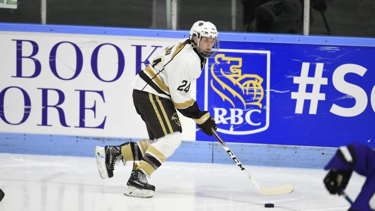 Bison forward Alanna Sharman skates up ice against the Western Mustangs in the U SPORTS Women's Hockey National final on March 20 in London, Ont.