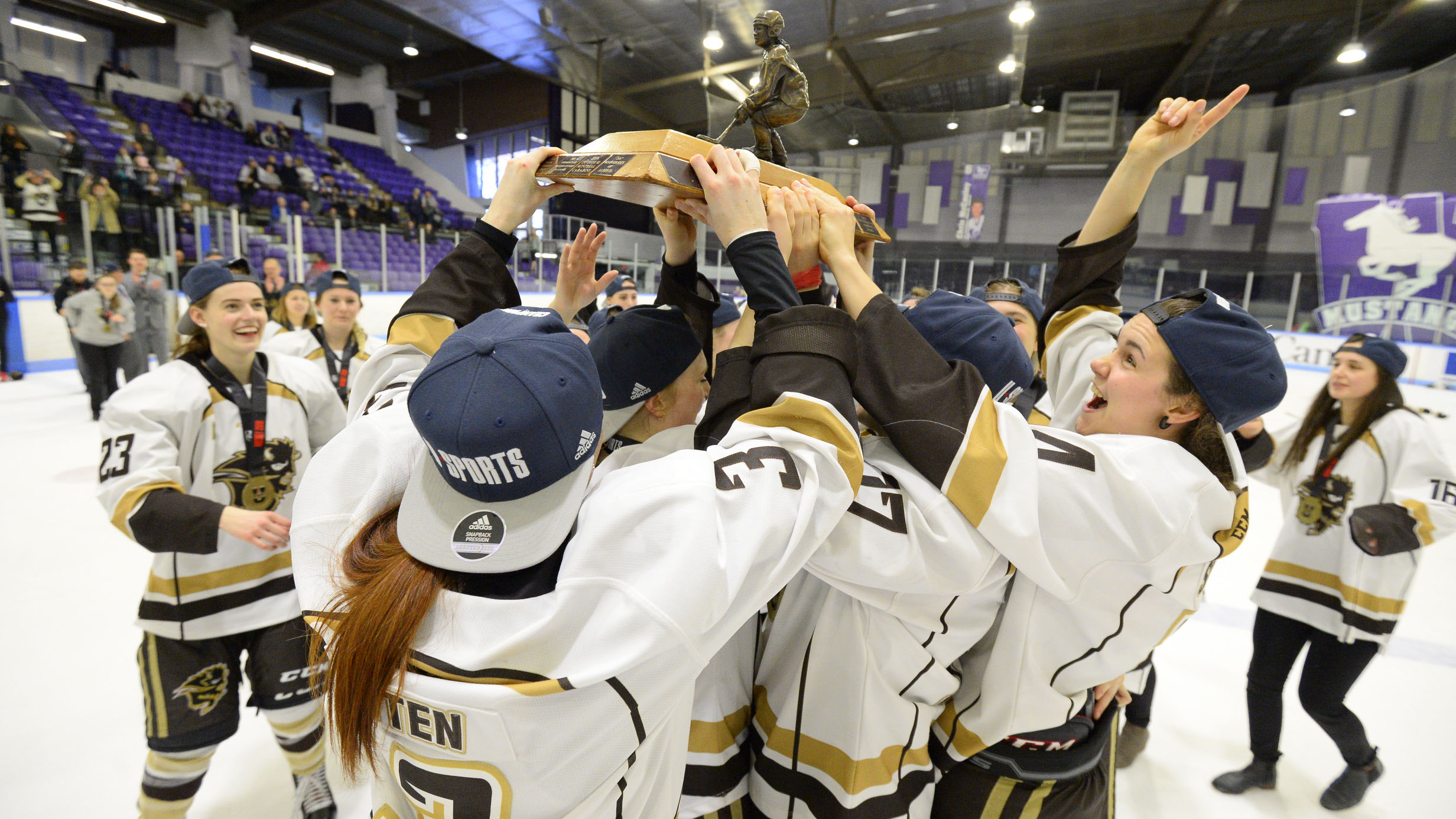 Sports_Bison Top Ten_Photo by Brandon VandeCaveye_RGB web Bisons with the Golden Path Trophy after beating the Western Mustangs 2-0 in the gold medal game on March 18 at the U SPORTS Nationals in London, Ont.