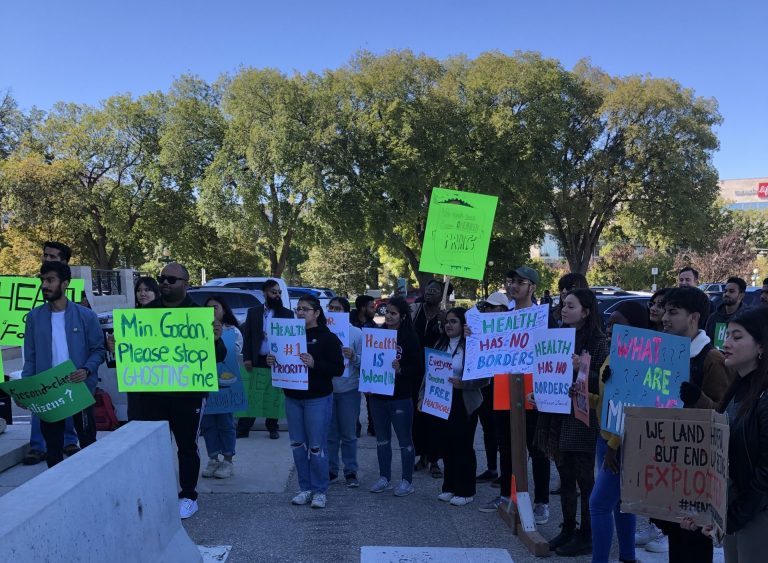 Rally demands free international student health care