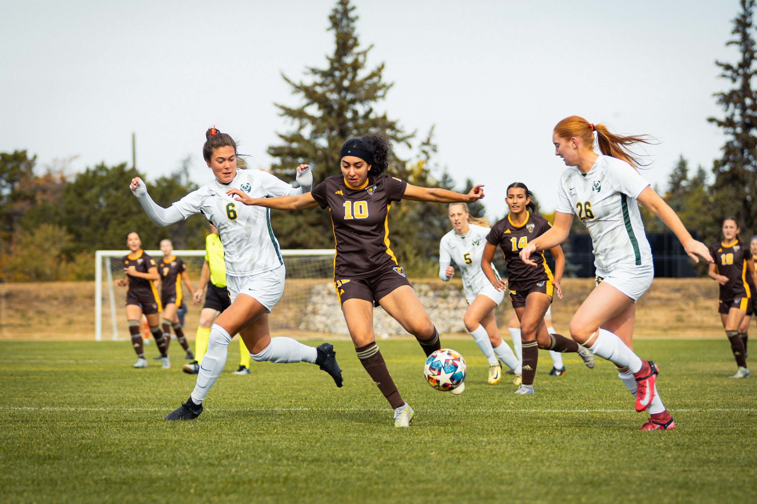 112_09_Sports_WSOCUofMvUofA_Supplied_1